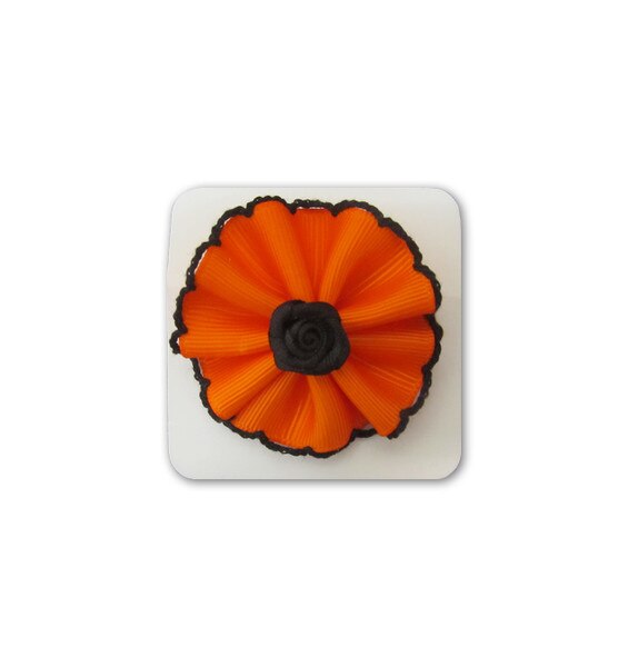 Black and orange stripe flower pin